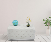 Velvet Upholstered Ottoman with a Chrome Base